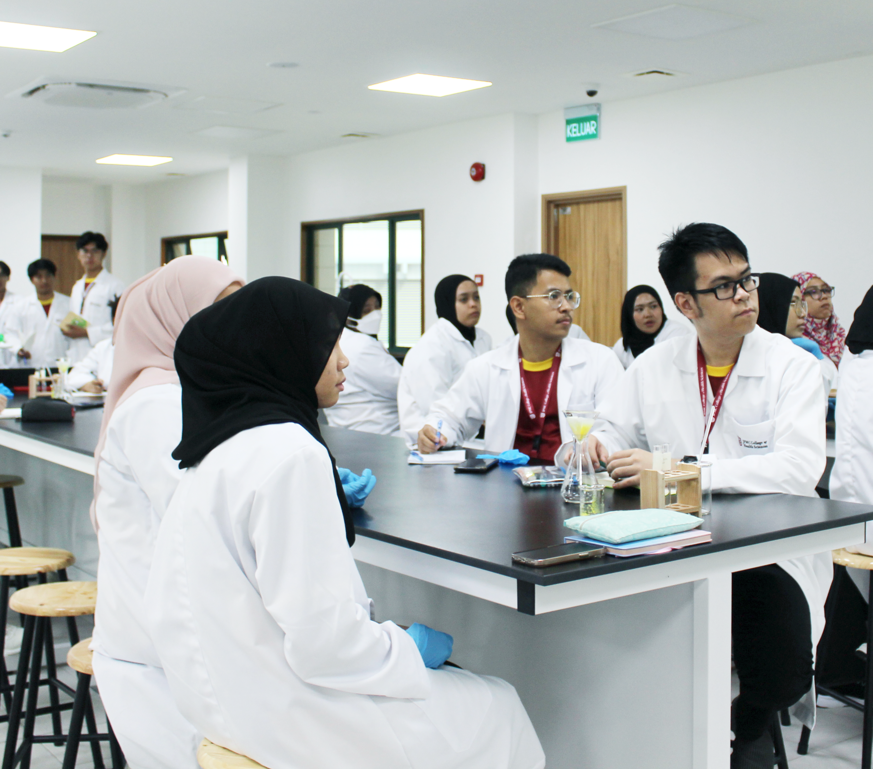 Bruneian students in lab gown in a Nursing School Brunei
