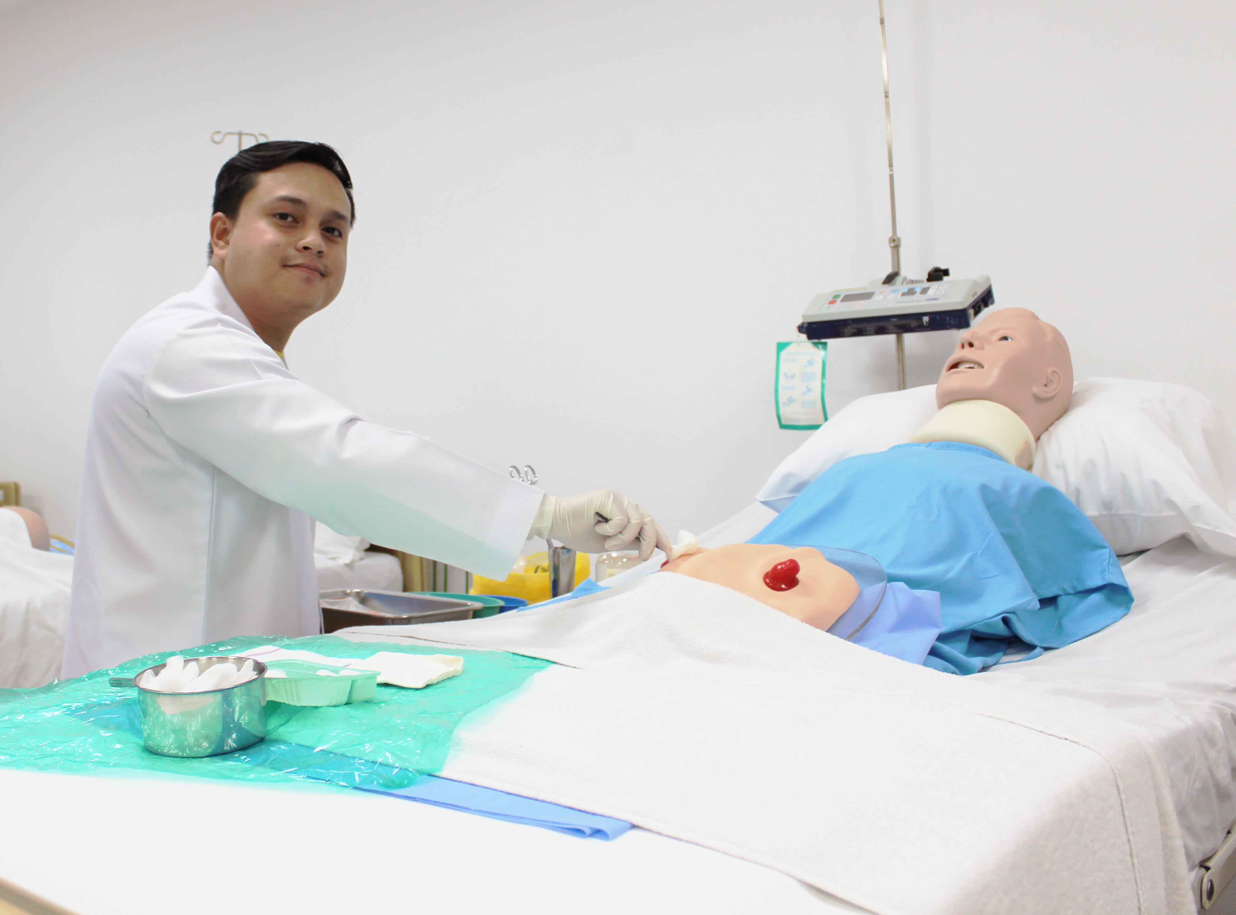 Student with patient in nursing school in Brunei